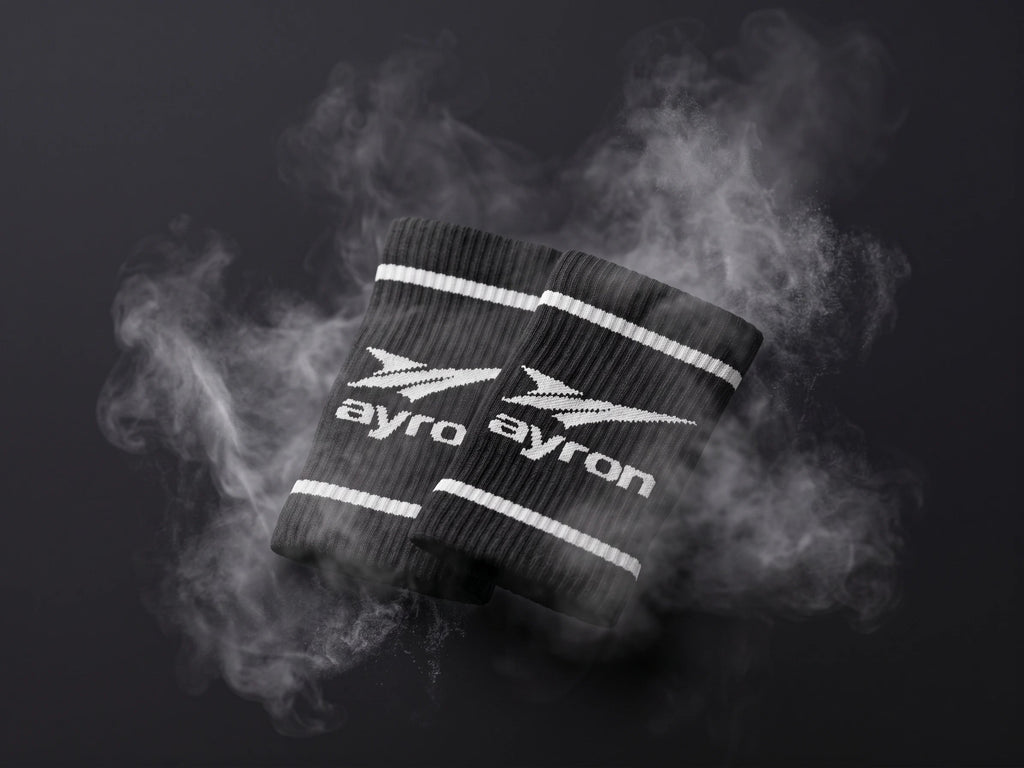 AYRON Serre-Poignets Noir — détail du logo AYRON tissé