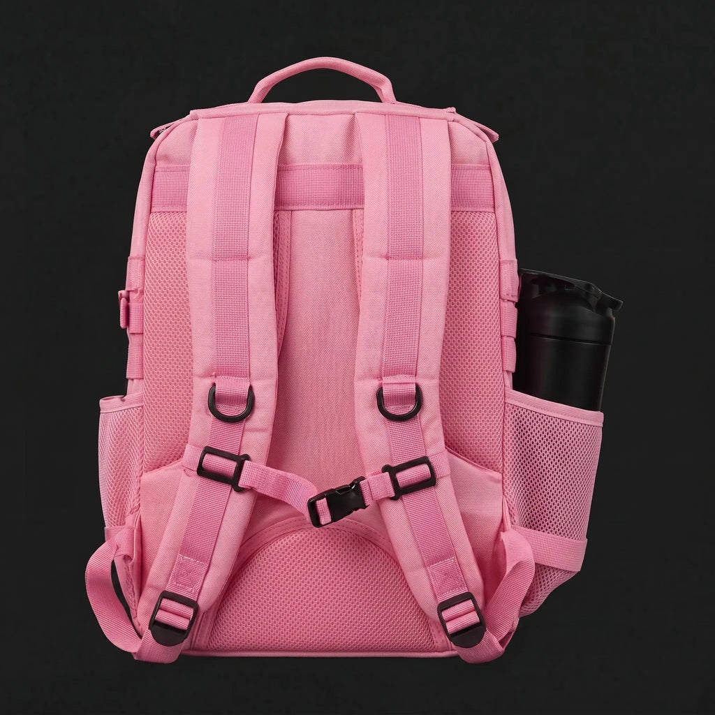 AYRON Sac Athlète 25L Rose — porté par un athlète en déplacement