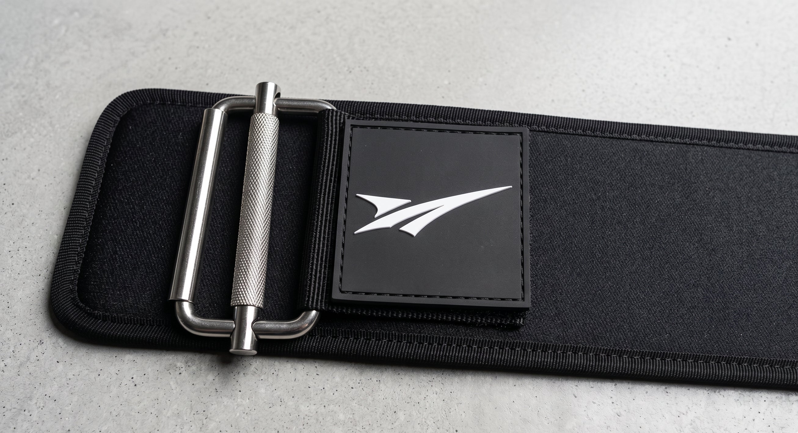 AYRON Ceinture de Force — logo AYRON embossé sur la boucle